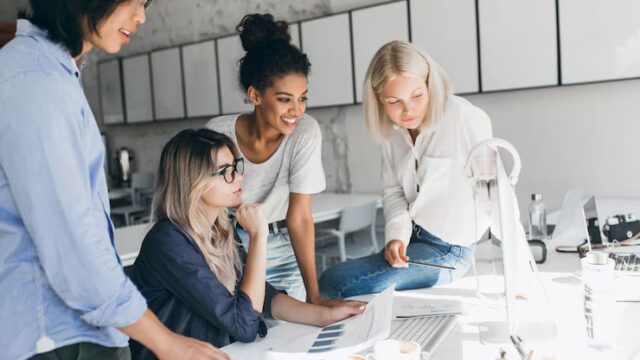 african-european-girls-looking-computer-screen-while-blonde-lady-reading-documents-indoor-portrait-asian-student-glasses-talking-with-female-friends-uniersity_197531-3792