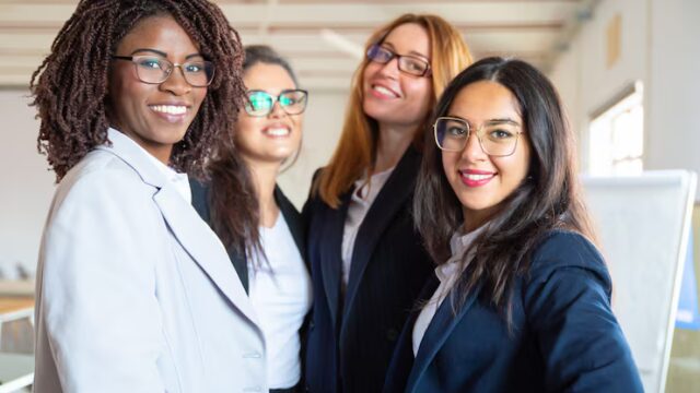 group-confident-young-businesswomen-looking-camera_74855-4275